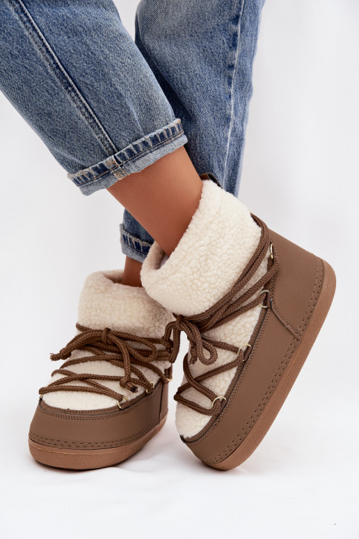 Bottes de neige Féminin avec un manteau de fourrure Typu Baranek avec des sangles beige Belira