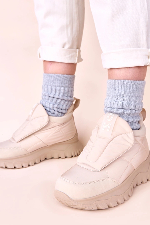 Zandkleurige dames sneeuwlaarzen met...