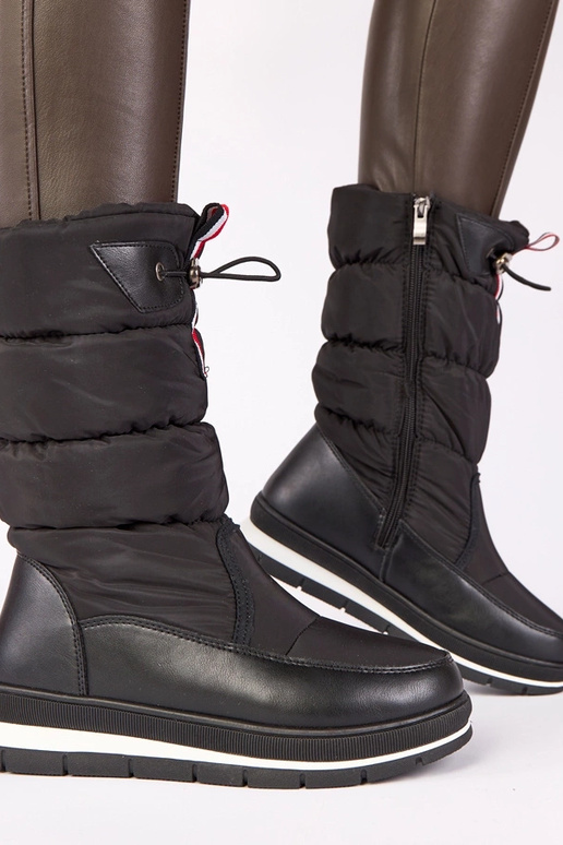 Bottes à neige noires à petit talon...