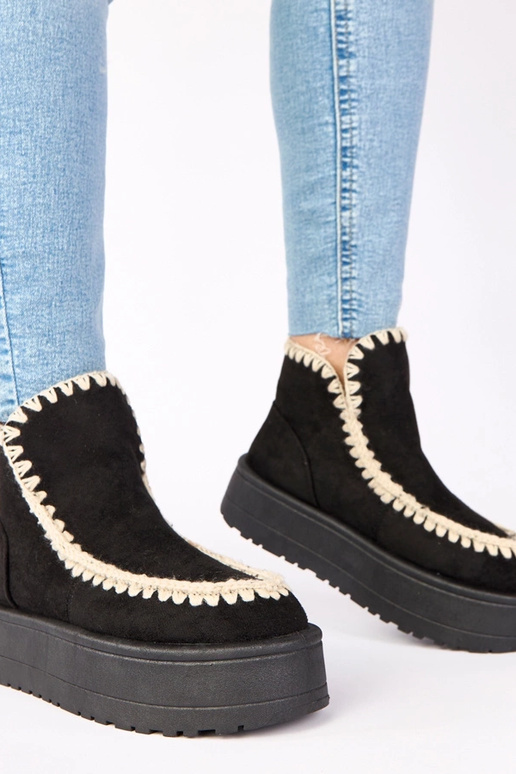 Bottes de neige noires sur plateforme...