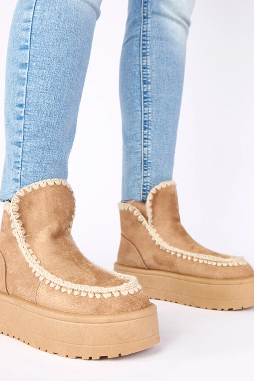 Bottes de neige beiges foncées sur...