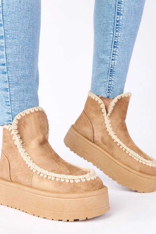 Bottes de neige beiges foncées sur...