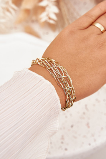 Un bracelet Cool Fabriqué en acier chirurgical couleur dorée