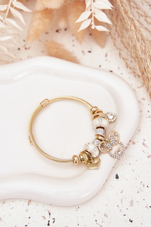 Un bracelet z ZaÀieszkami Charms couleur dorée