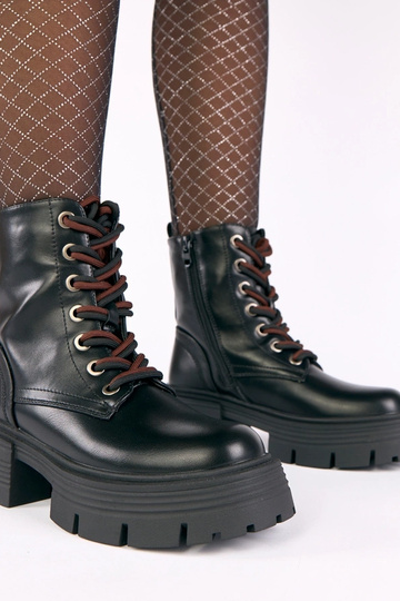 Bottines noires sur...