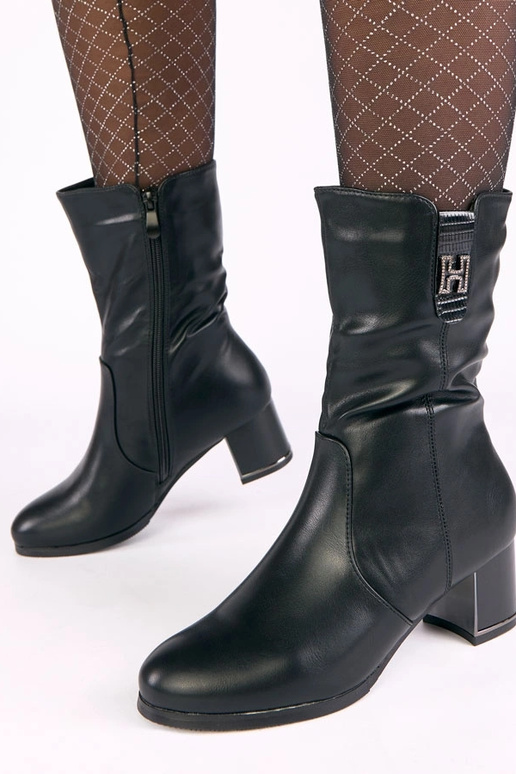 Bottines noires doublées en fourrure...