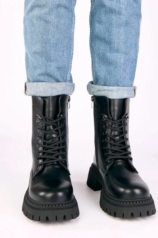 Bottes classiques noires à plateforme...