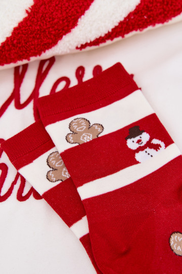 Dames kerstkniekousen met streepjes in rood-witte kleur