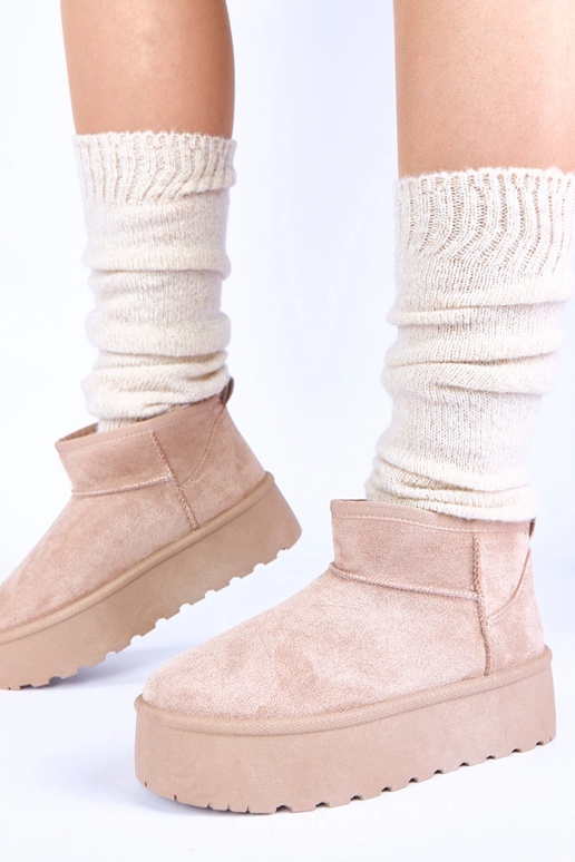 Bottes de neige sable sur plateforme...