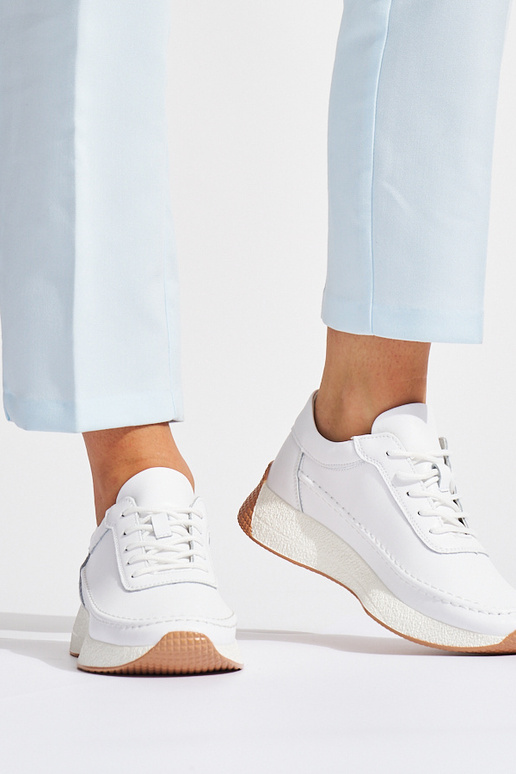Féminin peau couleur blanche chaussures de sport