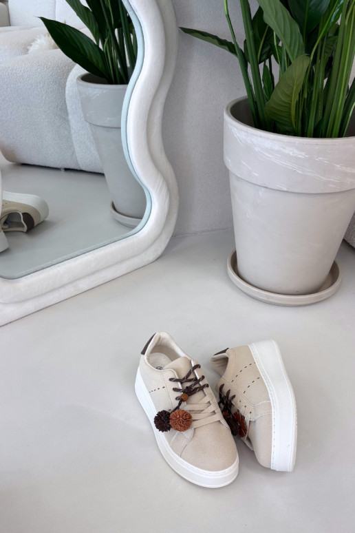 Zandkleurige Corinna dames platform sportschoenen met sierlijke pompons