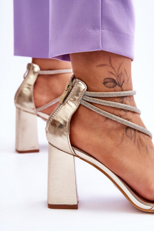 sandales à la mode avec des yeux qui clignotent couleur dorée Carma