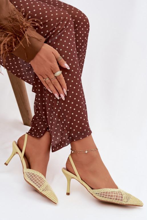 Sandales „Hanelis“ couleur jaune avec éléments ajourés et talons fins