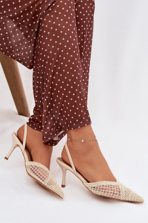 Sandales „Hanelis“ couleur ivoire avec éléments ajourés et talons fins