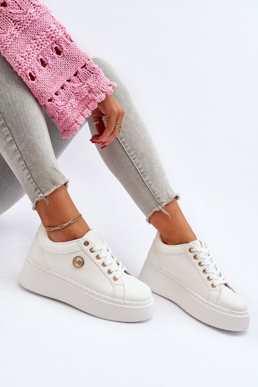 Faible Chaussures modèle baskets Féminin avec une plateforme couleur blanche Telirra