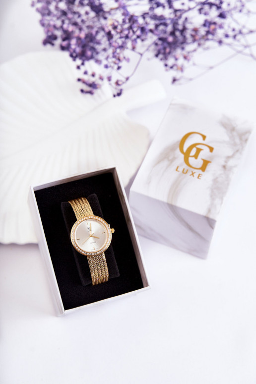 Montre femme GG Luxe couleur dorée Avec bouclier d argent