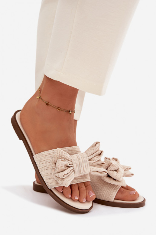 Dames slippers met brede hakken en strikken in zandkleur Amivelle