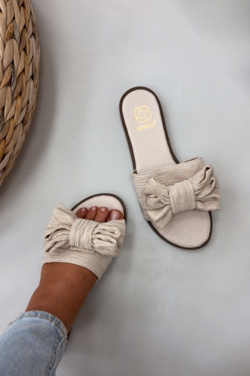 Dames slippers met brede hakken en strikken in zandkleur Amivelle