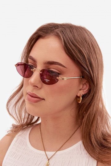 Des lunettes de soleil Féminin Rose foncé 2