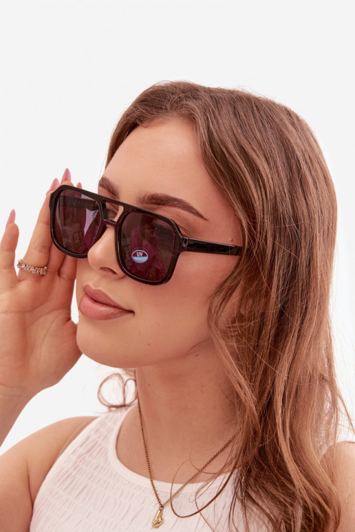 Des lunettes de soleil Féminin Noir et-couleur bleue