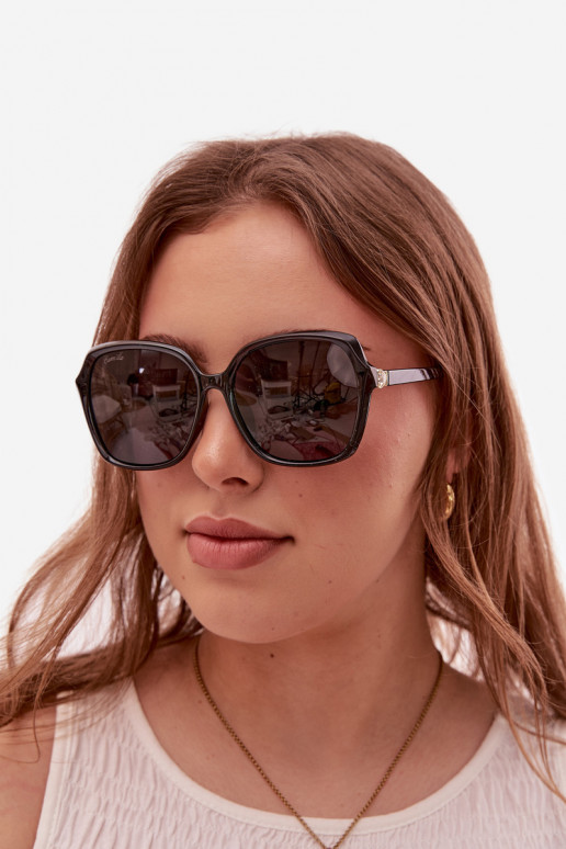 Sonnenbrille Feminin mit leuchtenden Augen schZuarze Farbe