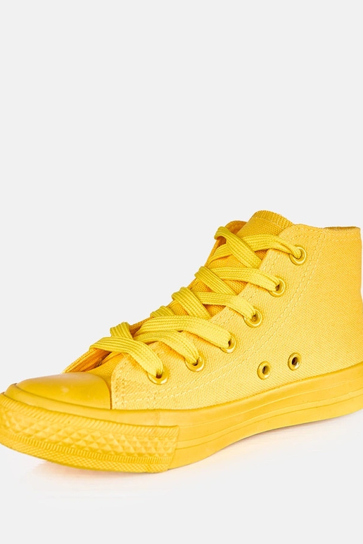 Baskets jaunes pour enfants au-dessus...