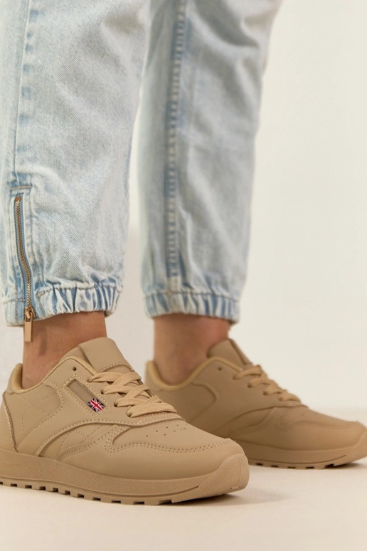 Zandkleurige dagelijkse sportschoenen...