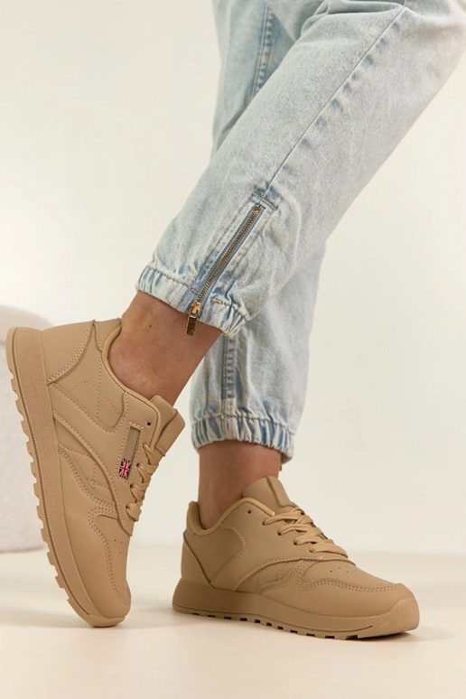 Zandkleurige dagelijkse sportschoenen...