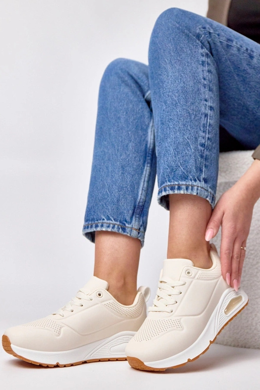 Zandkleurige sportschoenen met dikke...