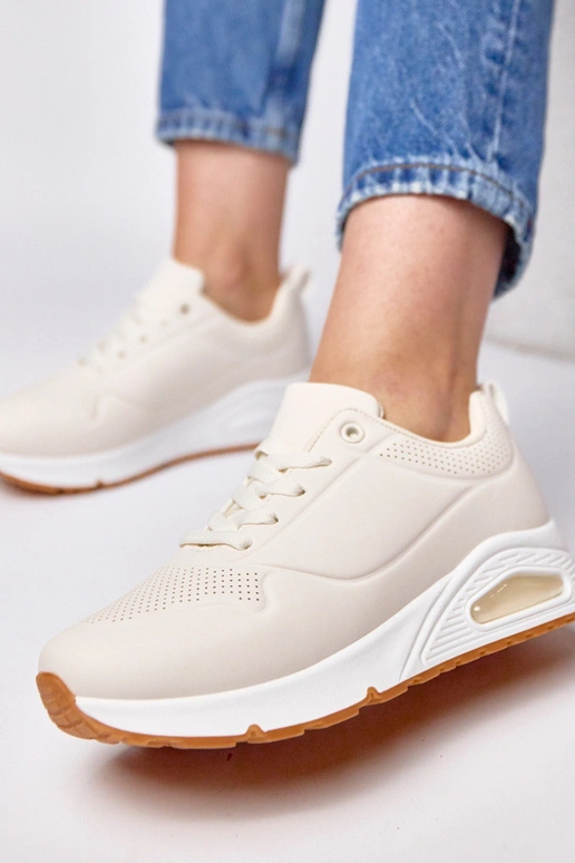 Zandkleurige sportschoenen met dikke...