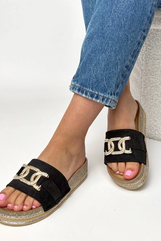 Schwarze Plattformslipper mit...