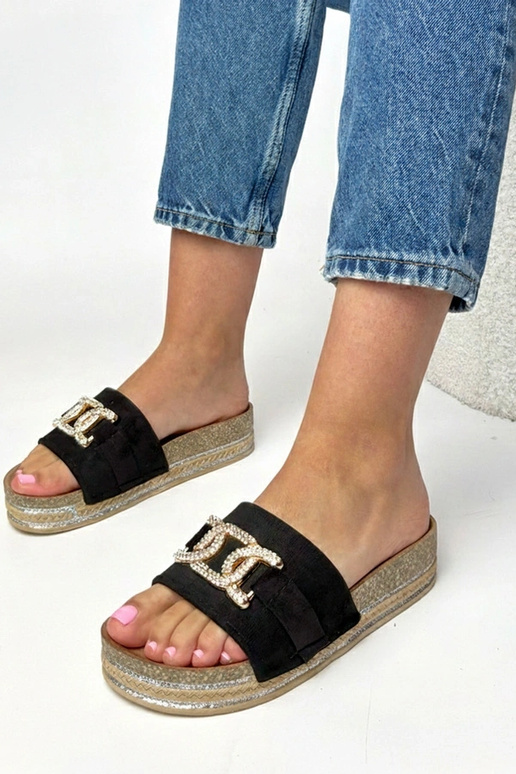 Schwarze Plattformslipper mit...