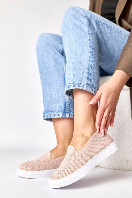 Baskets en textile rose avec des...