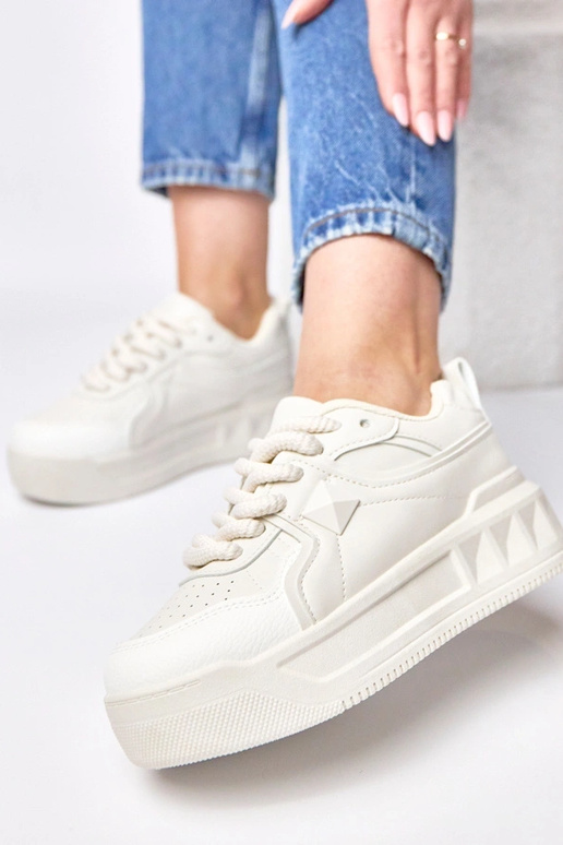 Sandfarbene Sportschuhe mit Plattform...