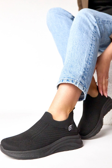 Schwarze textile Slip-On... 2