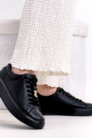 Zwarte leren sneakers met...