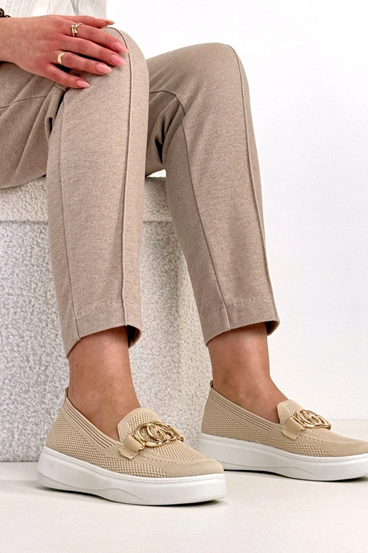 Zandkleurige instap stoffen sneakers...