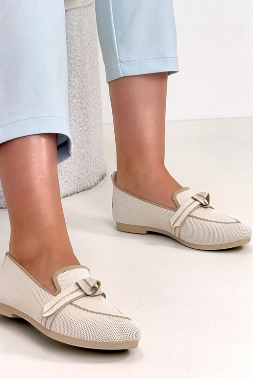 Zandkleurige stoffen ballerina's met...