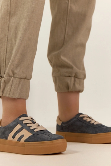 Grijze leren sneakers met...