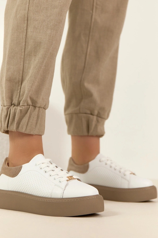 Witte leren sneakers met platform...