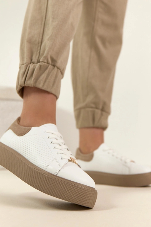 Witte leren sneakers met platform...