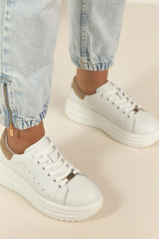 Witte leren sneakers met platform...
