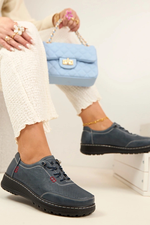 Dunkelblaue Lochmuster Halbschuhe...