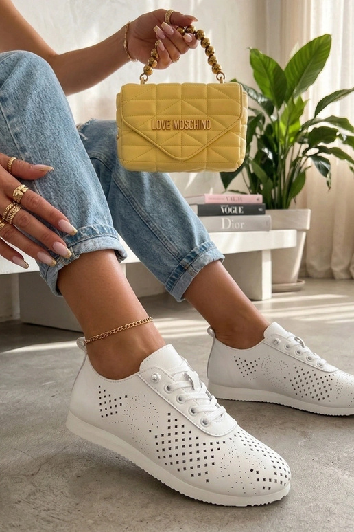 Witte geperforeerde sportieve...