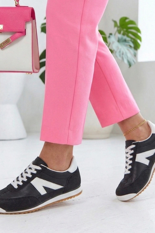 Zwarte sportschoenen met witte...