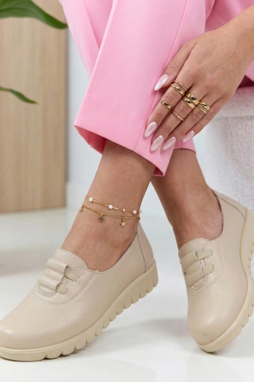 Bottines en sable à talon...