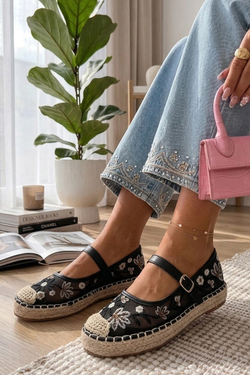 Schwarze Espadrilles mit...