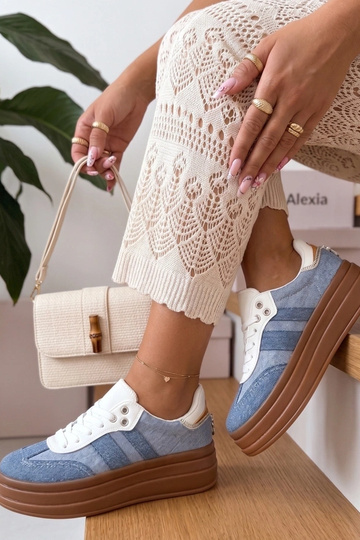 Blauwe sneakers met...