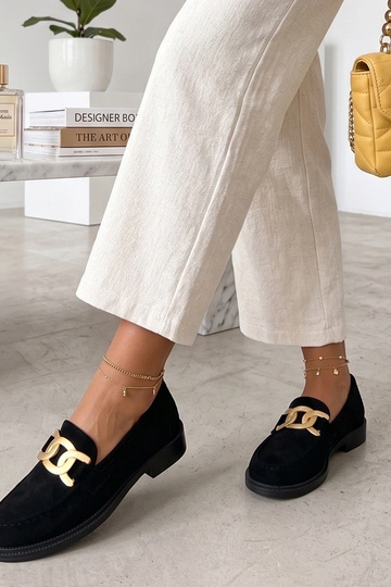 Zwarte mocassins met een...