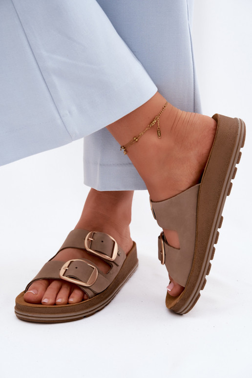Lederne Slipper mit Schnallen in Sandfarbe